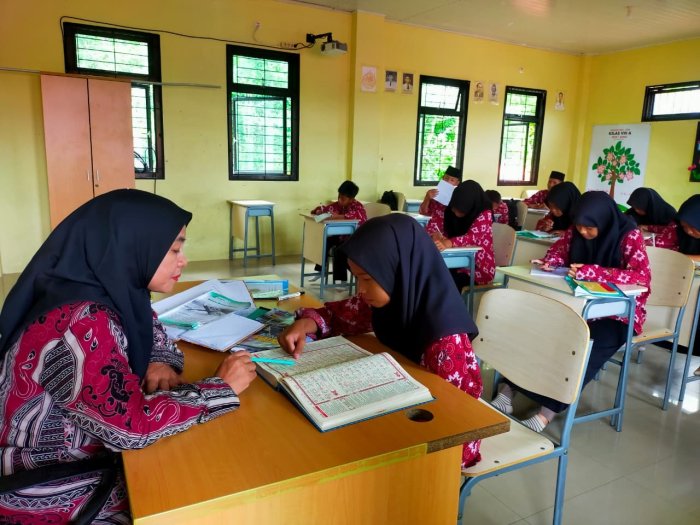 Praktik Al-Quran Hadits : Mengetahui Hukum Bacaan